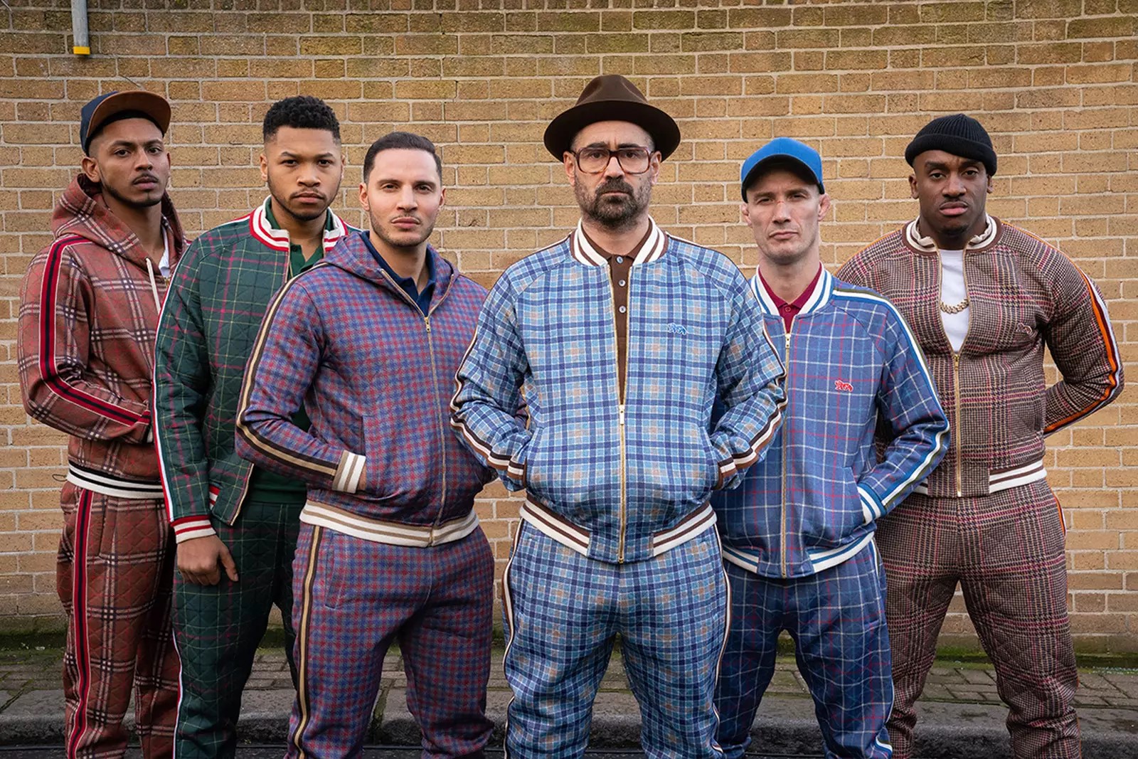 Film photo of Colin Ferrell's Coach and his Toddler gang starring rapper Bugzy Malone in Guy Ritchie's The Gentlemen