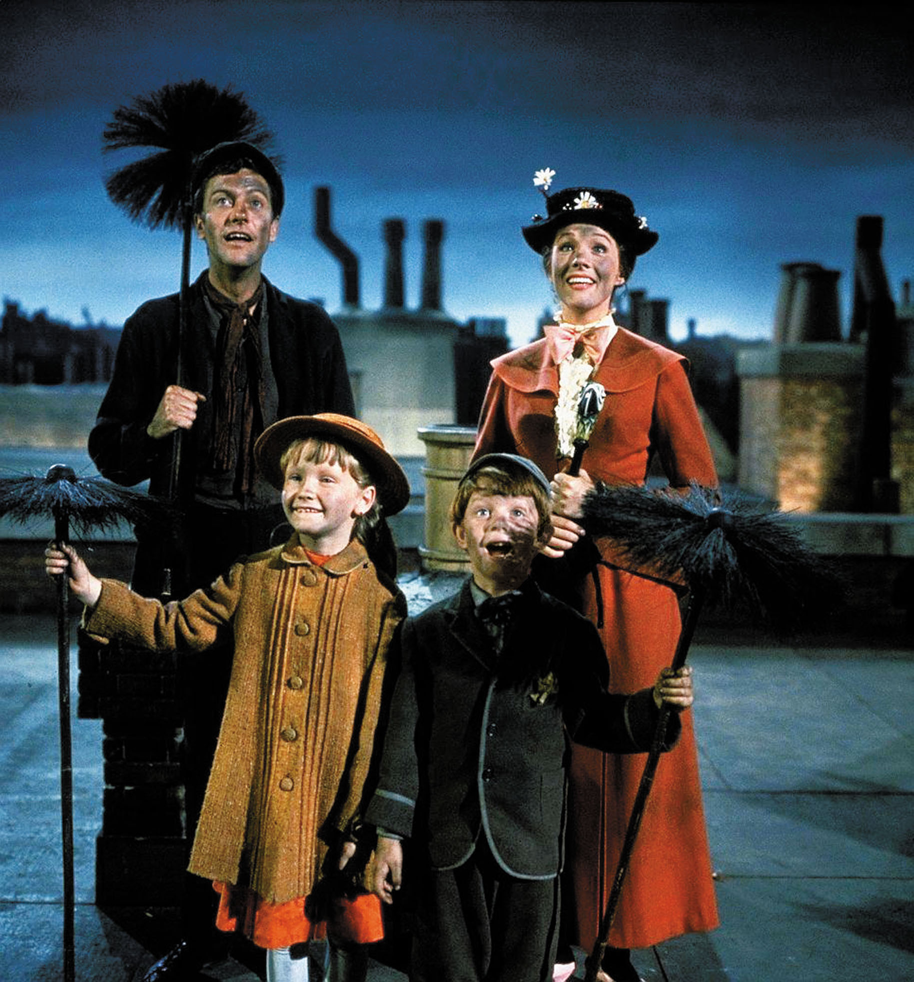 Dick Van Dyke and Julie Andrews in Mary Poppins with the Banks kids played by Karen Dotrice and Matthew Garber