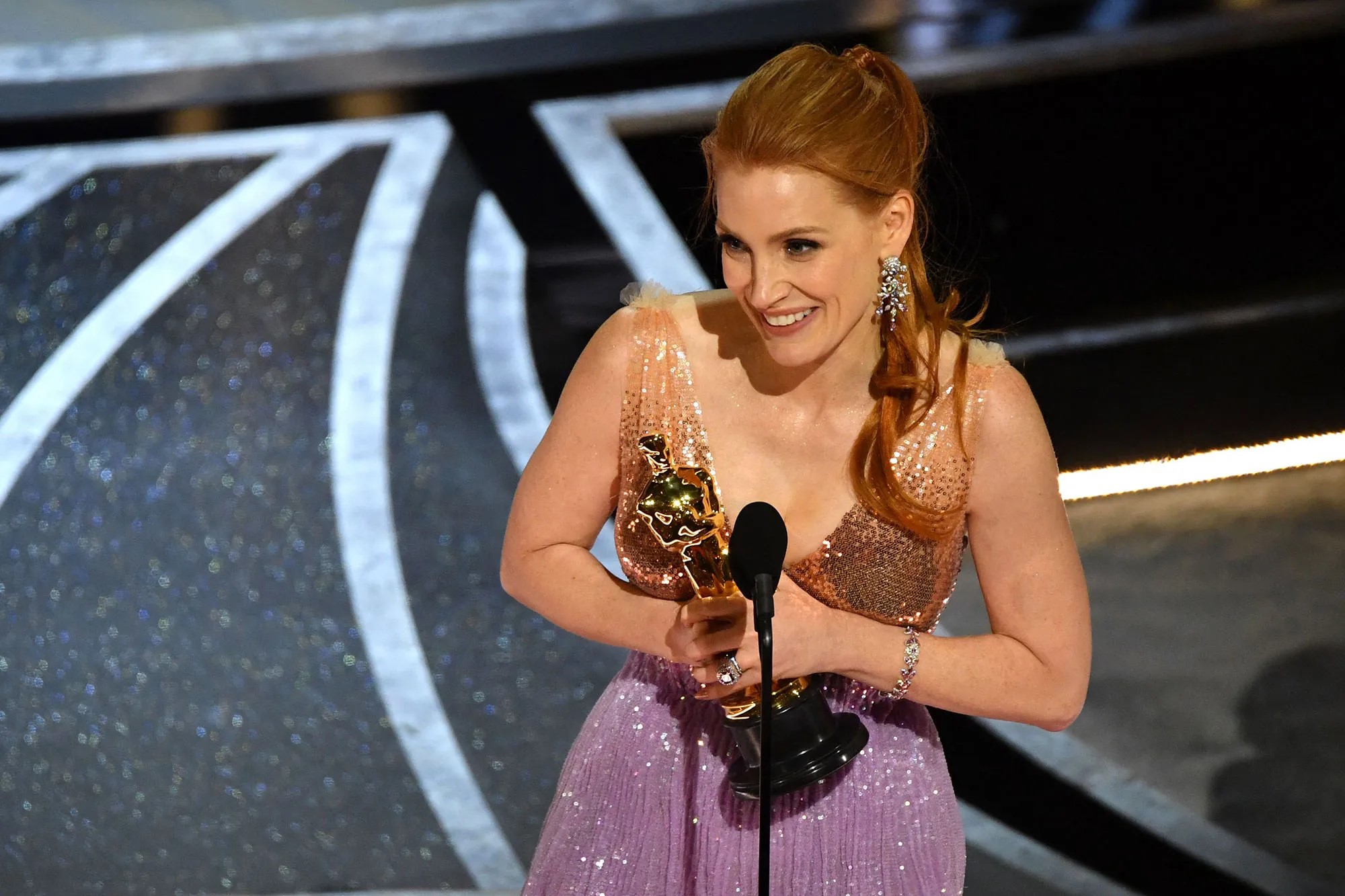 Jessica Chastain accepting her award at the Oscars 2022 for The Eyes of Tammy Faye