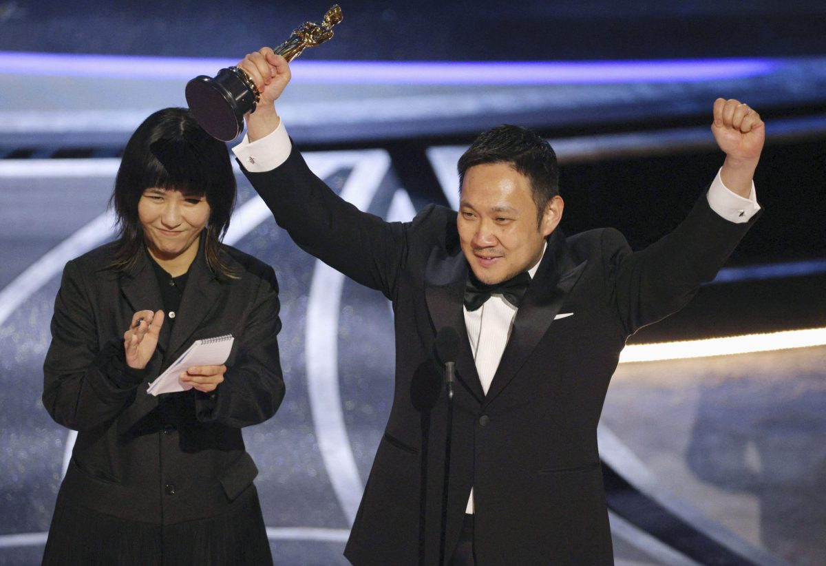 Ryusuke Hamaguchi accepting his award at the Oscars 2022 for Drive My Car