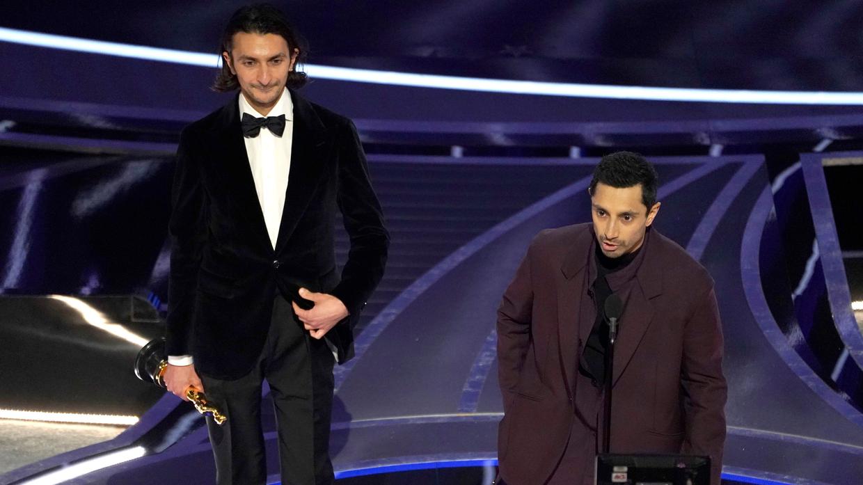 Aneil Karia and Riz Ahmed accepting their award at the Oscars 2022 for The long Goodbye